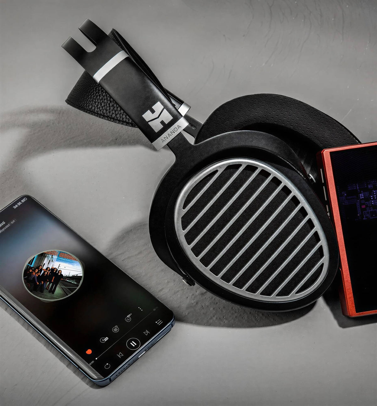 Ananda Stealth shown at scale next to call phone